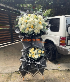 Kệ Hoa Chia Buồn Hồng Kem Phối Giấy Đen Hai Tầng