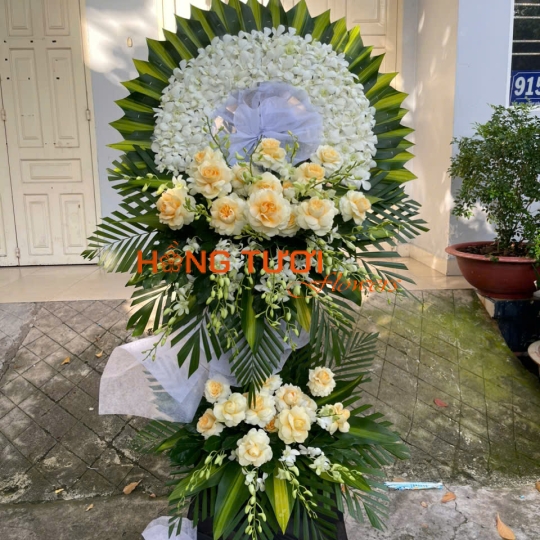 Kệ Hoa Chia Buồn Hai Tầng Lan Trắng Phối Hồng Kem