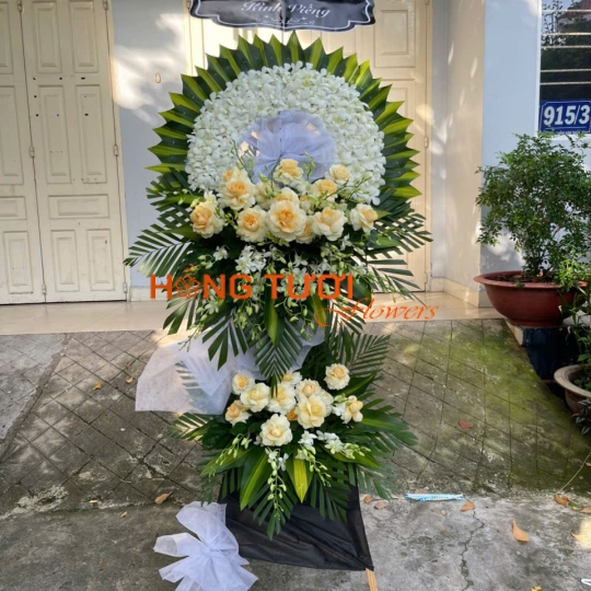 Kệ Hoa Chia Buồn Hai Tầng Lan Trắng Phối Hồng Kem