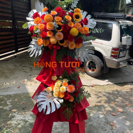 Kệ Hoa Tươi Hai Tầng Đỏ Cam Phối Hướng Dương