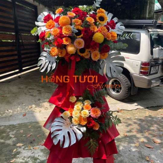 Kệ Hoa Tươi Hai Tầng Đỏ Cam Phối Hướng Dương